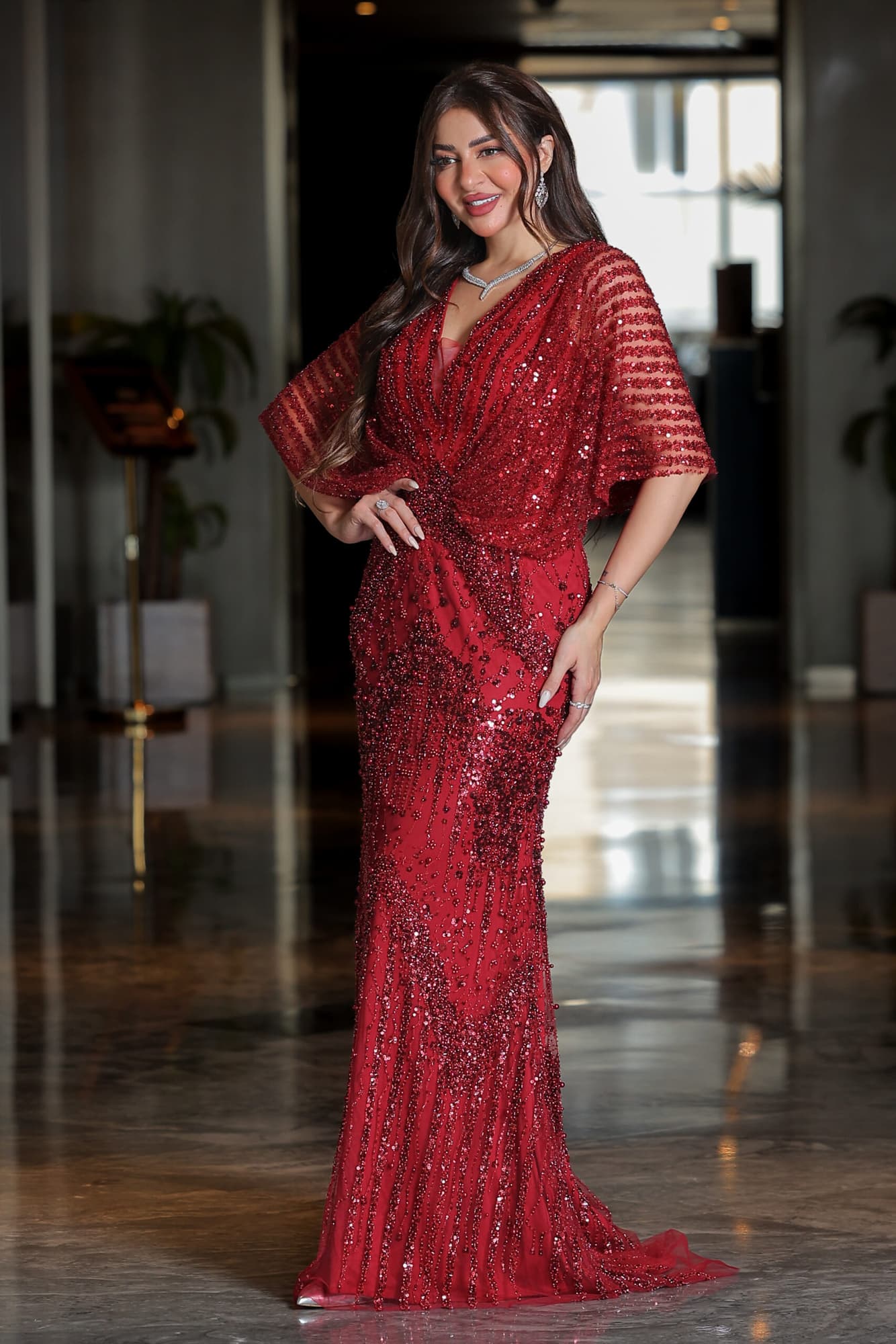 فستان سهرة بقصة فراشة مطرز بلؤلؤ وخرز